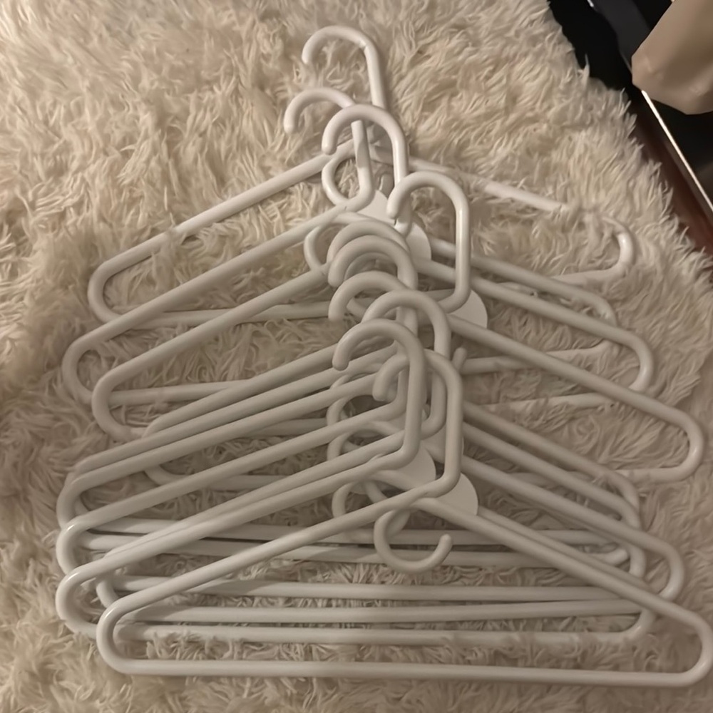 Set of White Plastic Hangers